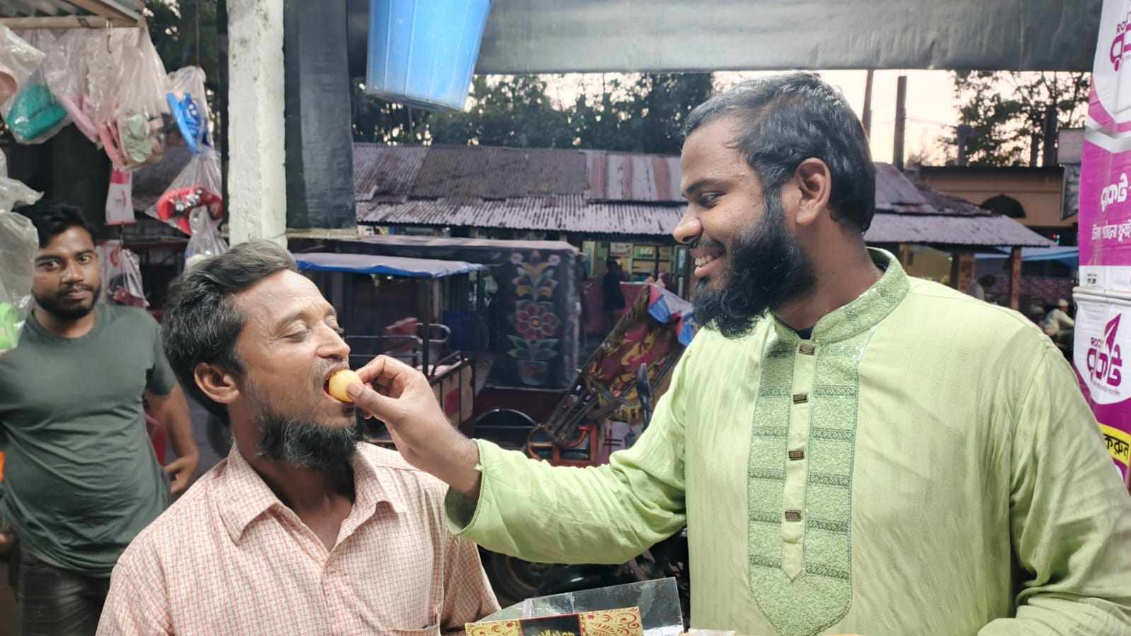 শেখ হাসিনার রায় ঘোষণার পর মিষ্টি বিতরণ করল দ্য রেড জুলাই কুড়িগ্রাম
